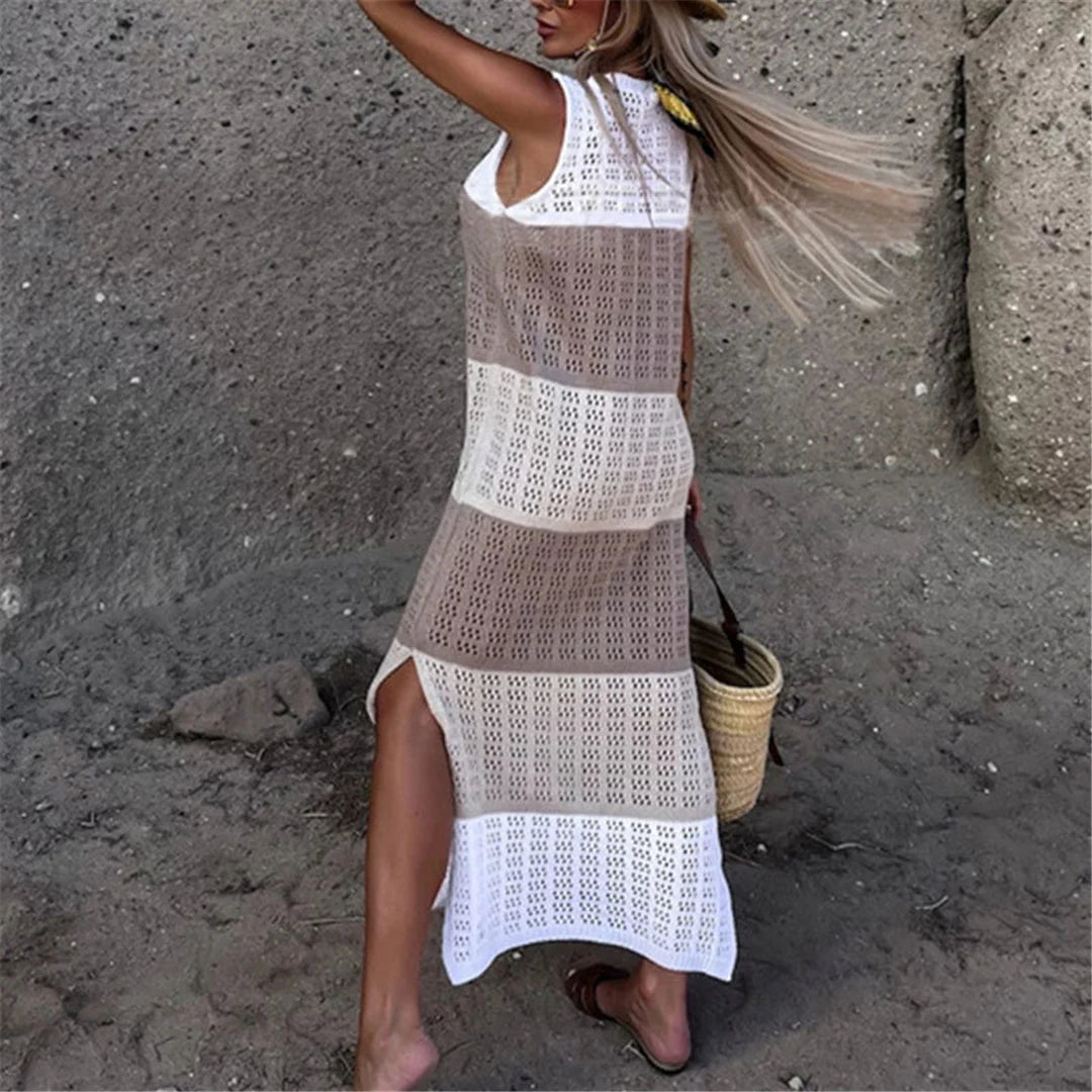 Tunique en tricot crocheté avec épissures et creux en blanc pour les femmes. Cette tunique de plage tendance présente un motif patchwork unique, fabriqué à partir d'un mélange de nylon, de polyester et de coton. Les détails évidés laissent entrevoir votre maillot de bain, tandis que le tricotage au crochet ajoute une touche d'élégance. Idéal pour les adultes âgés de 18 à 35 ans, il est disponible en tailles S, M et L pour un ajustement parfait. Cette pièce en stock offre une livraison gratuite et un look chic prometteur pour votre prochaine sortie à la plage.