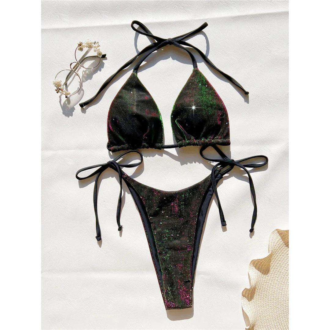 Dive into style with a gradient halter strappy bikini set, featuring a captivating gradient color scheme for elegant beachwear. Made from polyester and spandex, this two-piece swimsuit is wire-free, low waist, and includes supportive pads. Available in sizes S to XL, halter straps provide a secure fit for all-day comfort and confidence.