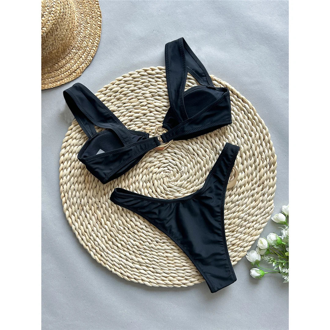 Metal ring Brazilian bikini set, high-leg design, polyester spandex blend, wire-free support, low waist, women's solid two-piece swimwear, stylish and modern look.