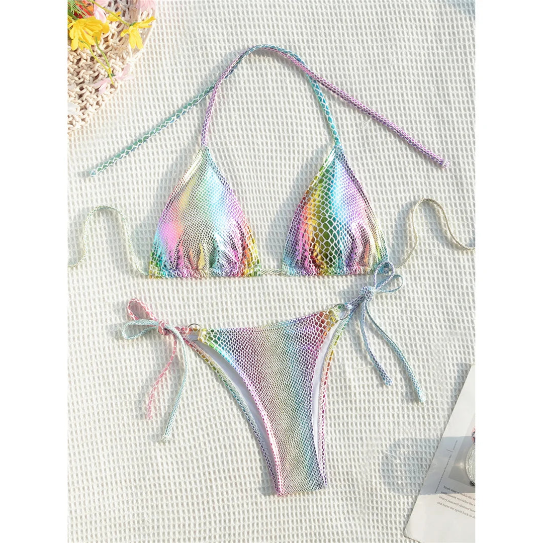 Unleash your wild side with a colorful snake skin halter strappy two-piece bikini set, featuring vibrant colors and a fierce snake skin pattern. Made from polyester and spandex, this wire-free, low waist bikini offers a flattering fit and includes comfortable halter straps and chic cut for any beach day adventure. Perfect for women seeking a bold statement by the water.