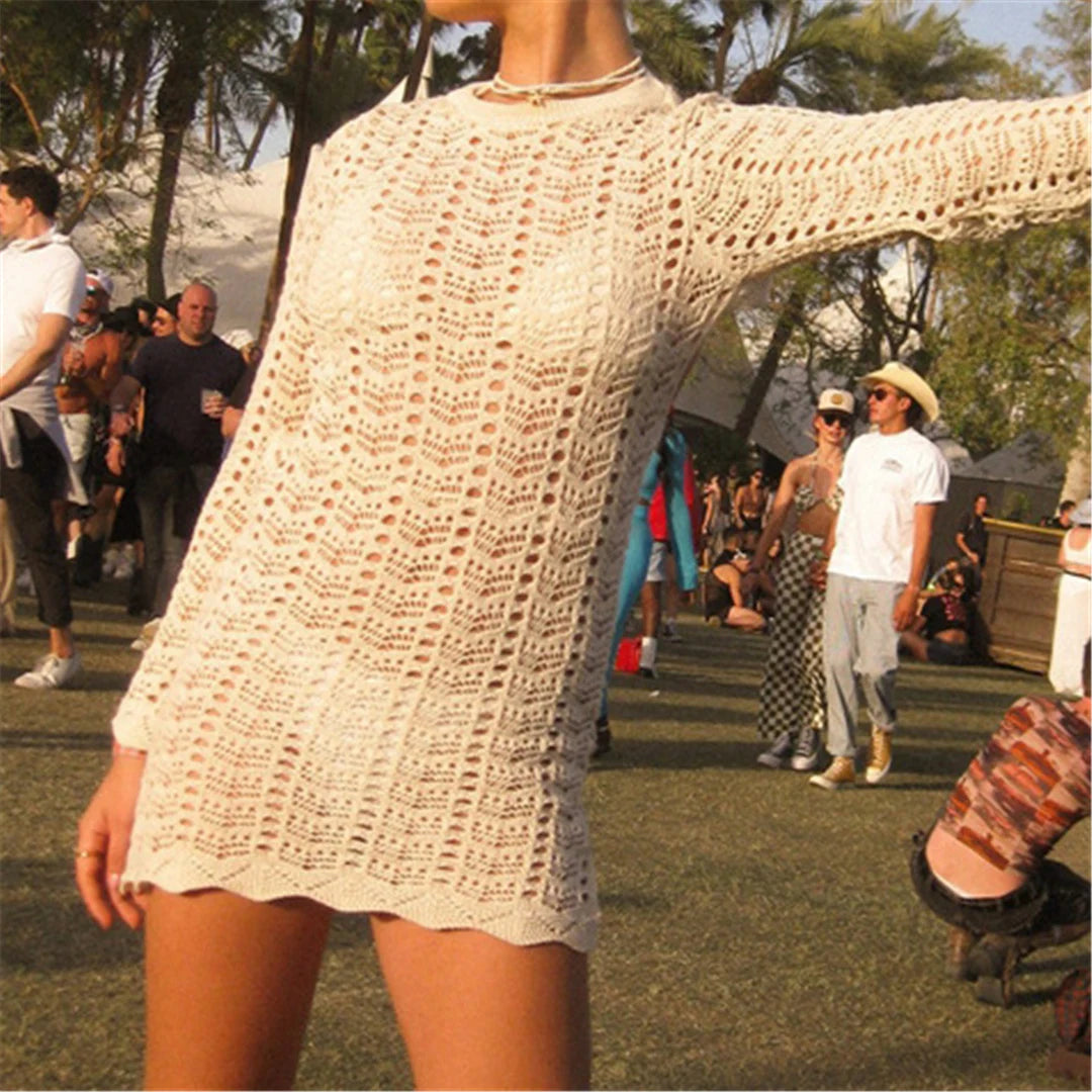 Elevate your beach style with an elegant long sleeve backless crochet tunic, crafted from polyester with a solid pattern. This knitted beach cover-up is perfect for adding sophistication to seaside outings, featuring a delicate crochet design and breezy backless fit. Available in stunning colors for a must-have addition to any beachwear collection.