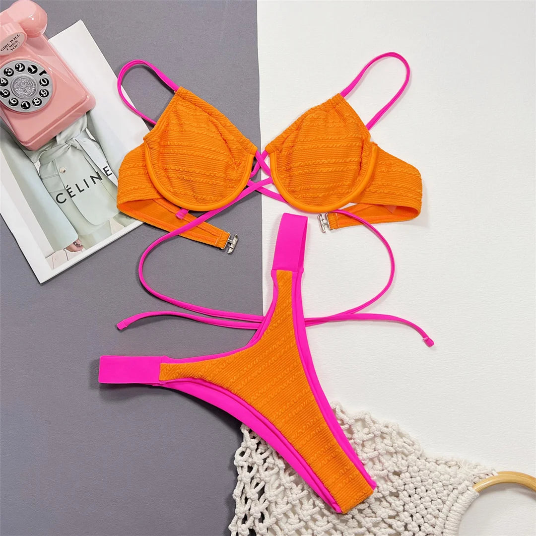 Elegant spliced underwired Brazilian bikini set with patchwork pattern, offering low waist fit and exceptional support, crafted from polyester and spandex for women. Available in colors: Orange Red, Orange, Red, Multicolor.