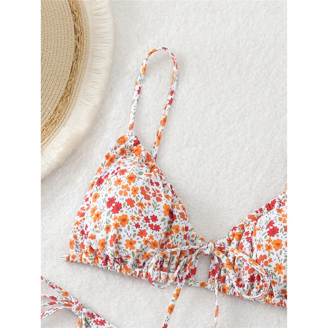 Flowers Printed Floral High Leg Cut Bikini set with captivating floral print, Polyester Spandex material, wire-free, low waist design for women, enhances curves for a stylish beachside look.