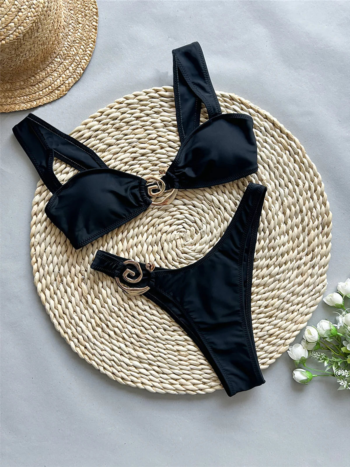 Metal ring Brazilian bikini set, high-leg design, polyester spandex blend, wire-free support, low waist, women's solid two-piece swimwear, stylish and modern look.